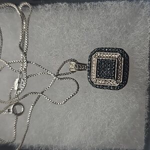 enuine Blue Diamond NecklaceNatural Diamond Accented Rhodium Over Brass